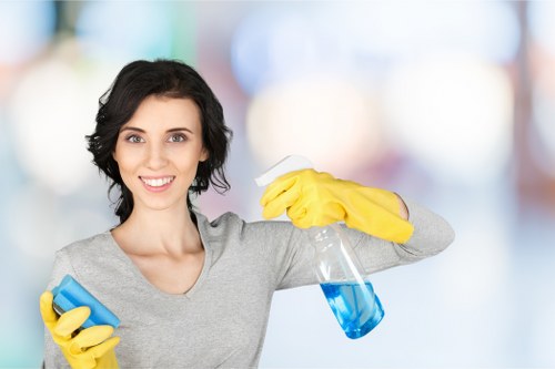 Cleaner preparing cleaning equipment before a service appointment