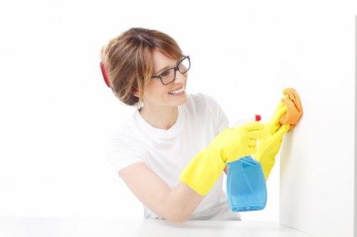 Local technician cleaning a hard floor in a Collierswood property